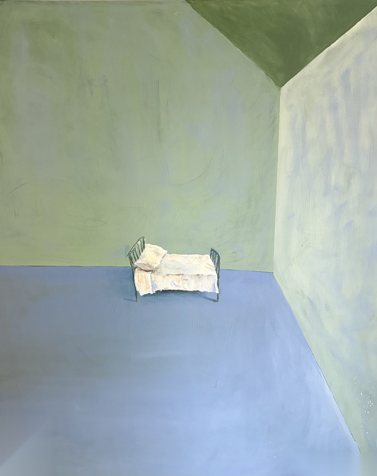 A Bed In An Empty Room